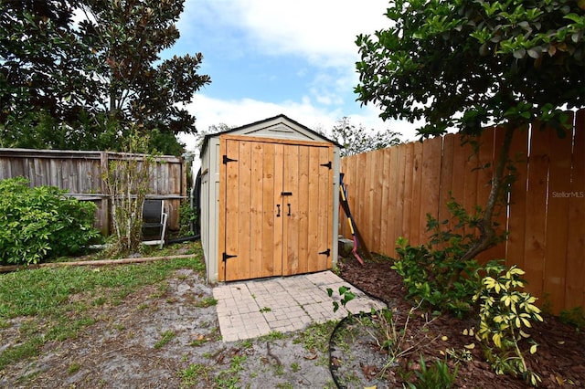 1611 Chestnut Ave, Winter Park, FL 32789 - view of shed with a fenced backyard