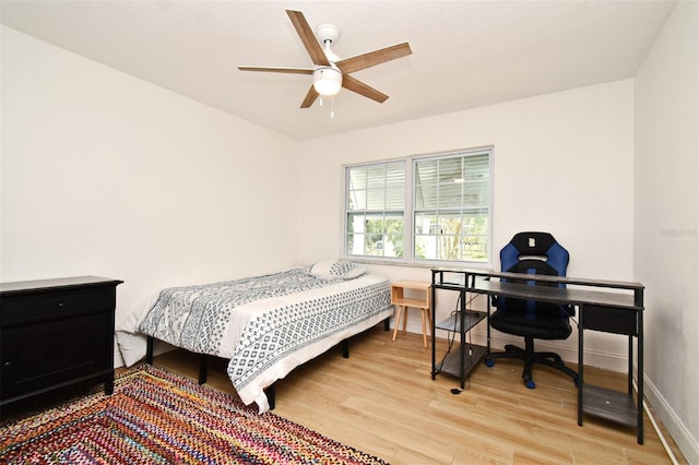 1611 Chestnut Ave, Winter Park, FL 32789 - bedroom featuring light wood finished floors and a ceiling fan