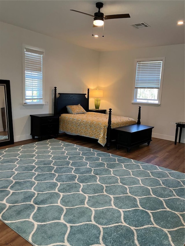 1611 Chestnut Ave, Winter Park, FL 32789 - bedroom with wood finished floors, baseboards, and a ceiling fan