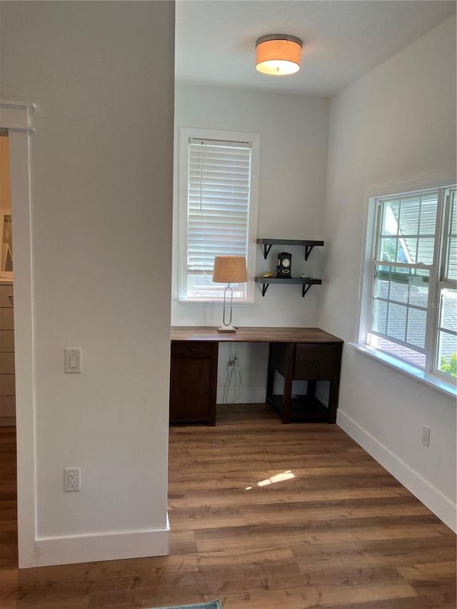 1611 Chestnut Ave, Winter Park, FL 32789 - unfurnished office featuring wood finished floors and baseboards