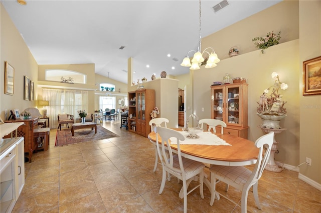 dining area with baseboards, visible vents, lofted ceiling, and an inviting chandelier