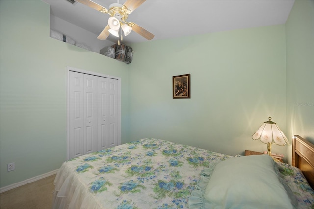 carpeted bedroom featuring baseboards, a closet, and ceiling fan