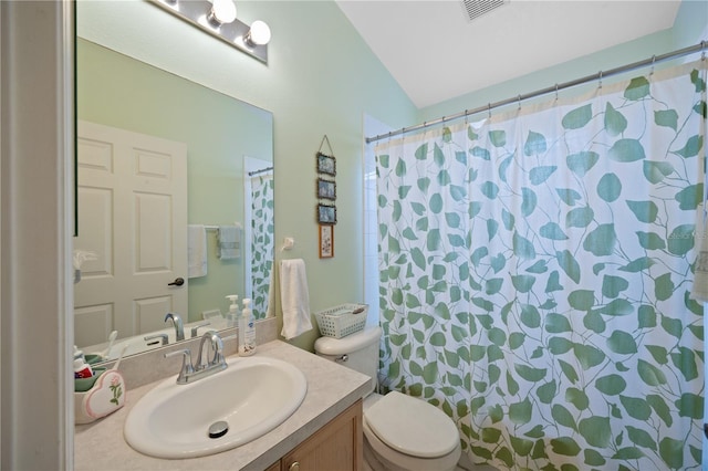 bathroom featuring vanity, a shower with shower curtain, toilet, and visible vents