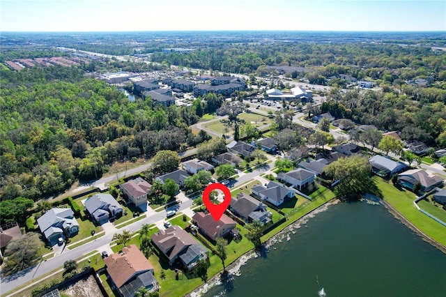 aerial view with a residential view and a water view