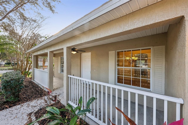 view of exterior entry with a porch