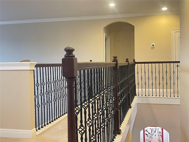 hall with recessed lighting, carpet flooring, crown molding, and baseboards