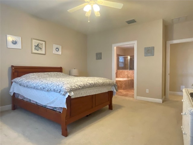 bedroom featuring ceiling fan, light colored carpet, visible vents, and baseboards