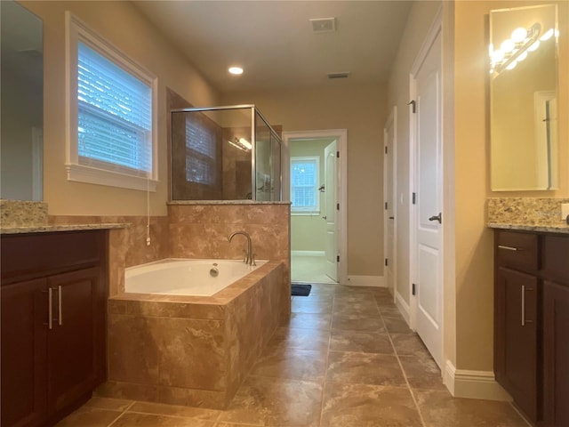 full bath featuring visible vents, a shower stall, vanity, tile patterned flooring, and a bath