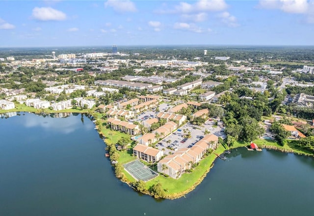 birds eye view of property featuring a water view