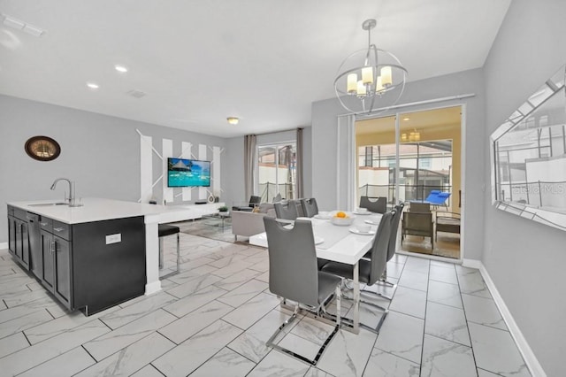 dining room with visible vents, baseboards, marble finish floor, an inviting chandelier, and recessed lighting