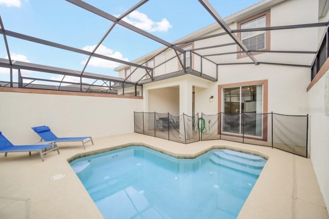 outdoor pool with glass enclosure