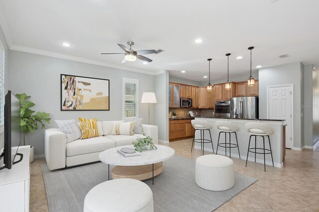 981 Galway Blvd, Apopka, FL 32703 - living area featuring baseboards, a ceiling fan, recessed lighting, and crown molding