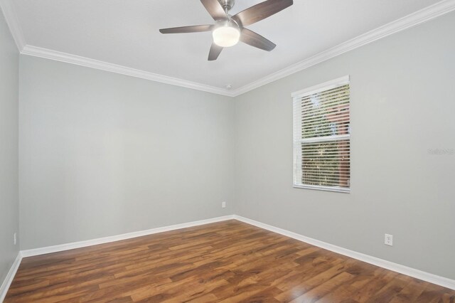 981 Galway Blvd, Apopka, FL 32703 - spare room featuring baseboards, a ceiling fan, ornamental molding, and dark wood-style flooring