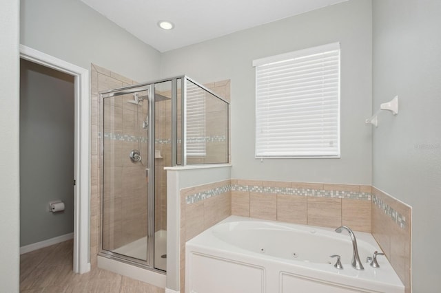 981 Galway Blvd, Apopka, FL 32703 - full bath featuring a tub with jets, tile patterned flooring, baseboards, and a shower stall