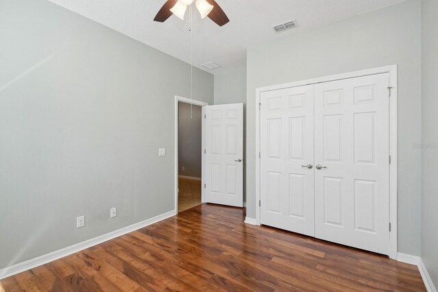 981 Galway Blvd, Apopka, FL 32703 - unfurnished bedroom featuring a closet, visible vents, baseboards, ceiling fan, and wood finished floors