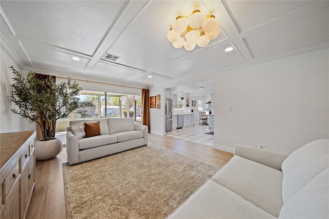 7746 Westmoreland Dr, Sarasota, FL 34243 - living room with coffered ceiling, ornamental molding, visible vents, and recessed lighting