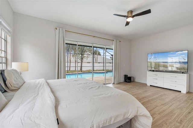 bedroom featuring ceiling fan, light wood-type flooring, and access to outside