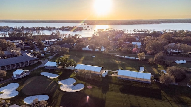 aerial view at dusk with a water view