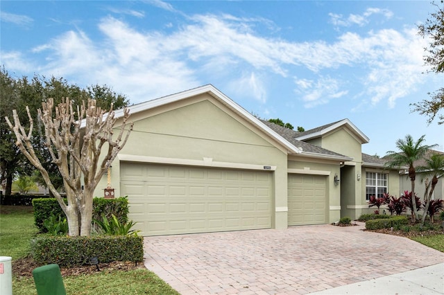 ranch-style home with a garage