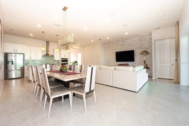 dining space with visible vents and recessed lighting