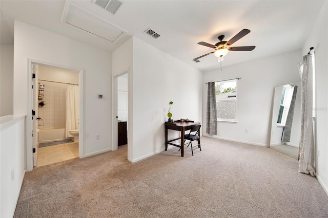 unfurnished bedroom featuring light carpet, visible vents, and baseboards