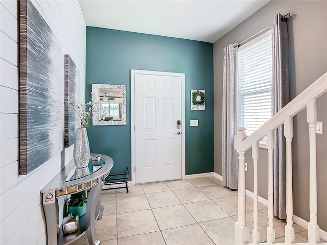 entryway featuring light tile patterned flooring