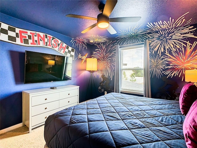 bedroom featuring ceiling fan and carpet flooring