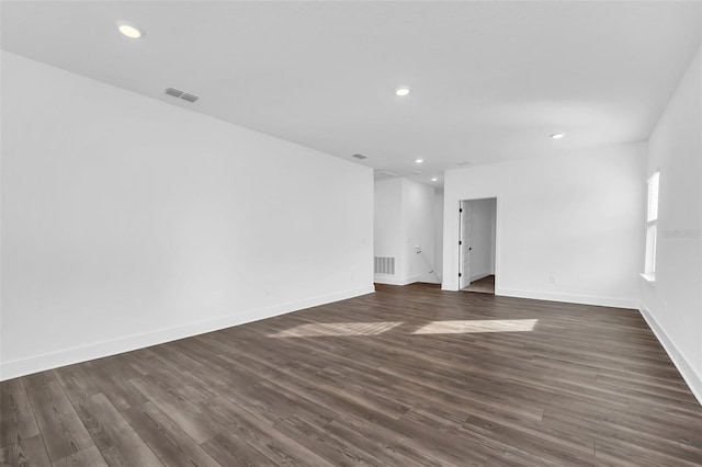 empty room featuring dark hardwood / wood-style floors