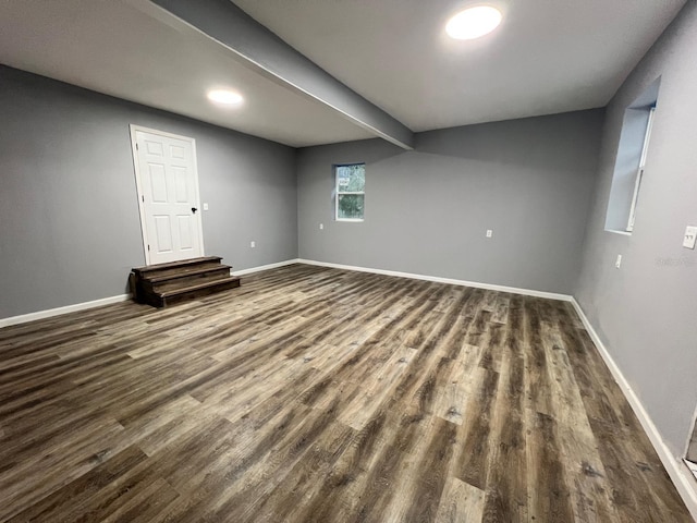 basement with dark wood-type flooring