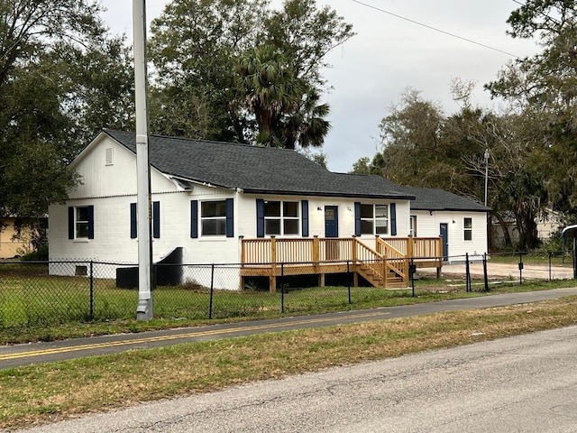 view of front facade with a deck