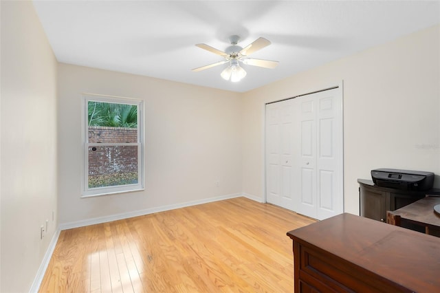 office area with hardwood / wood-style flooring and ceiling fan