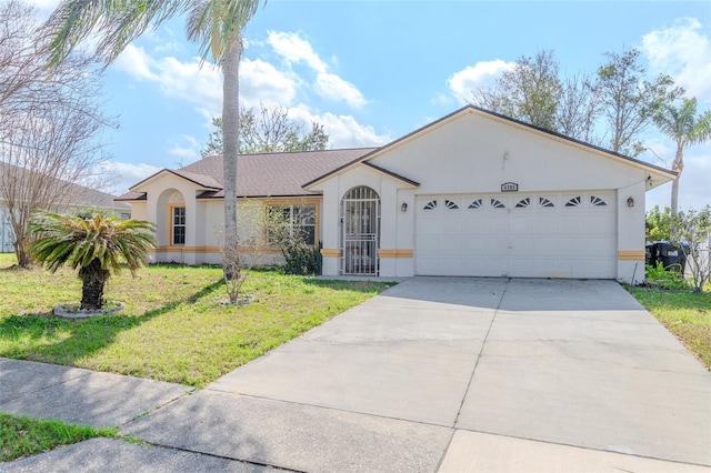 ranch-style home with concrete driveway, a front yard, an attached garage, and stucco siding