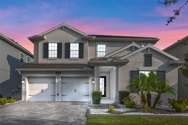 view of property featuring a garage