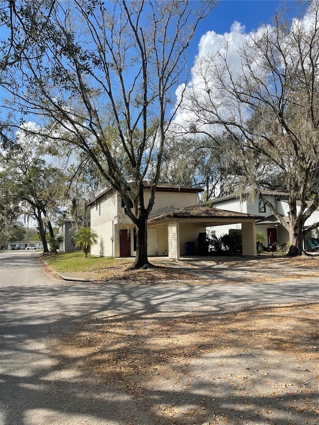 view of property exterior featuring a garage