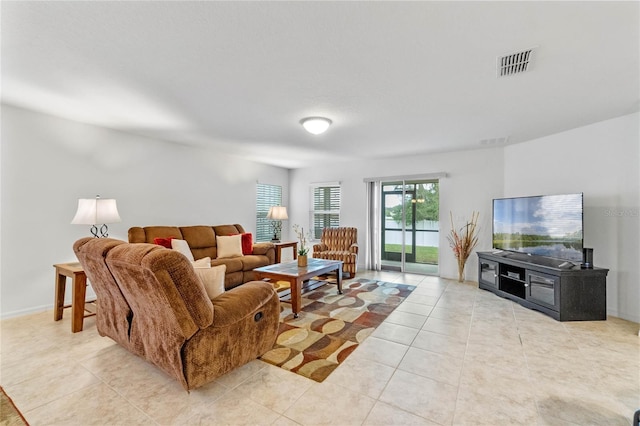 living room featuring light tile patterned floors