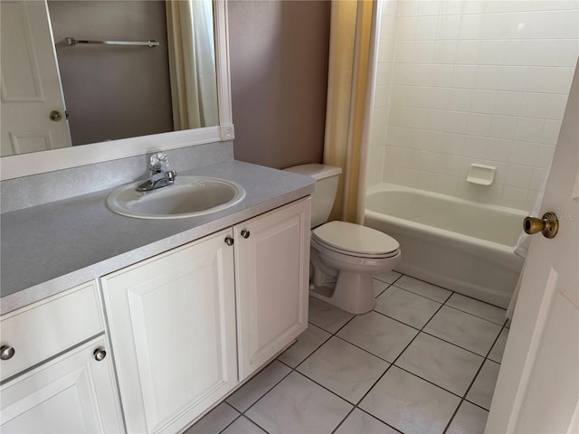 full bathroom with tiled shower / bath, vanity, toilet, and tile patterned flooring