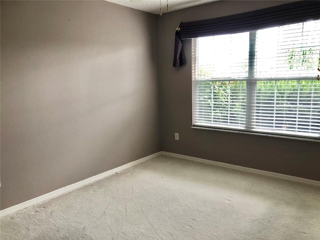 2628 Caribe Dr, The Villages, FL 32162 - spare room featuring carpet floors and baseboards