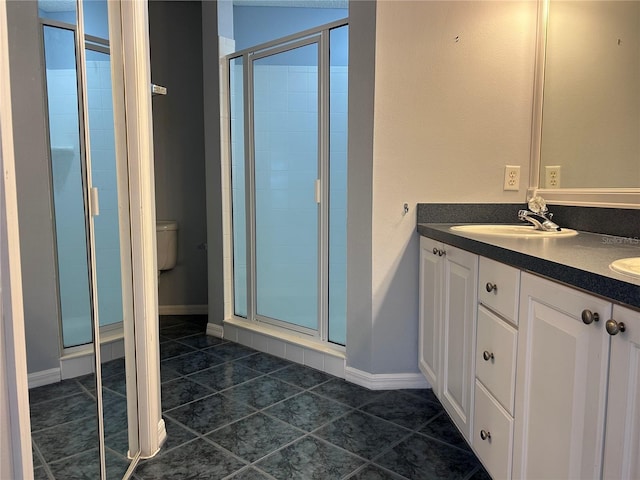 2628 Caribe Dr, The Villages, FL 32162 - bathroom with tile patterned floors, a stall shower, and double vanity