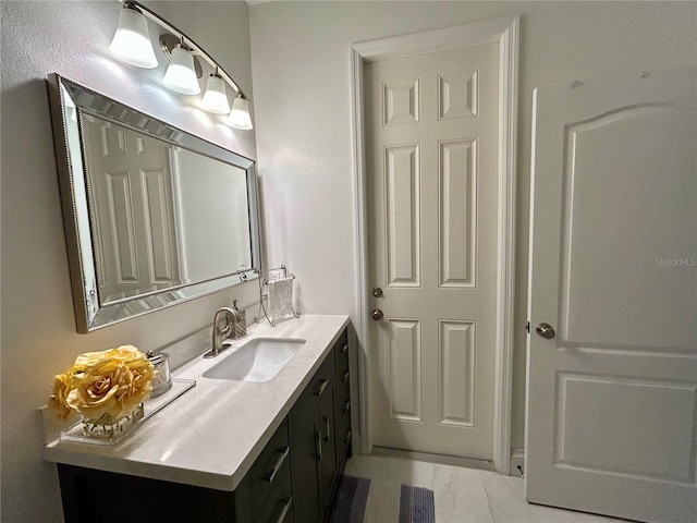 bathroom featuring visible vents, marble finish floor, and vanity