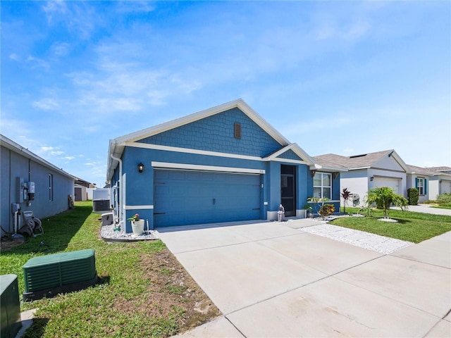 view of front facade featuring a garage and a front yard