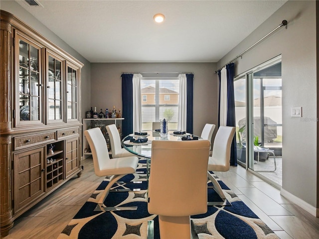 dining room featuring light hardwood / wood-style floors