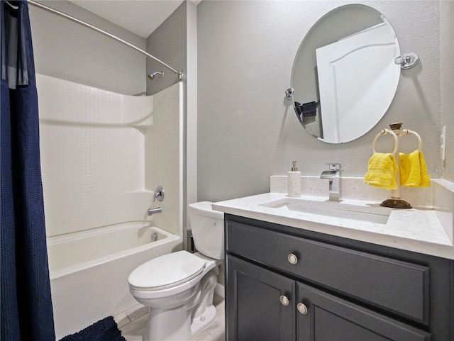 full bathroom with vanity, shower / bath combo with shower curtain, and toilet