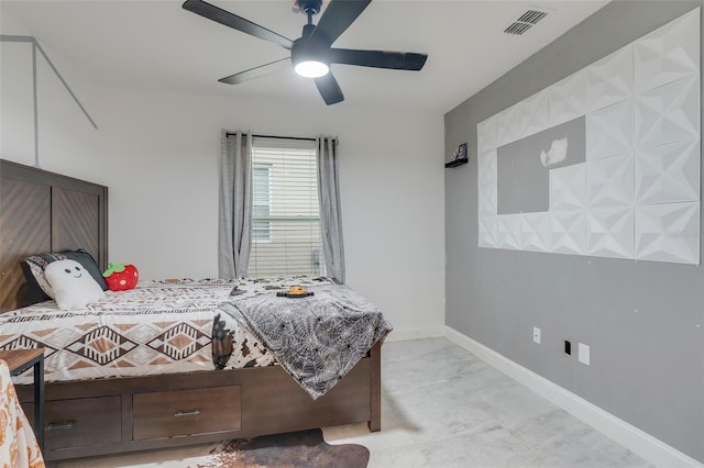 bedroom featuring a ceiling fan, visible vents, and baseboards