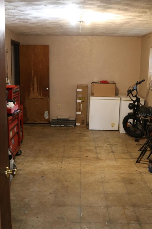 basement with fridge