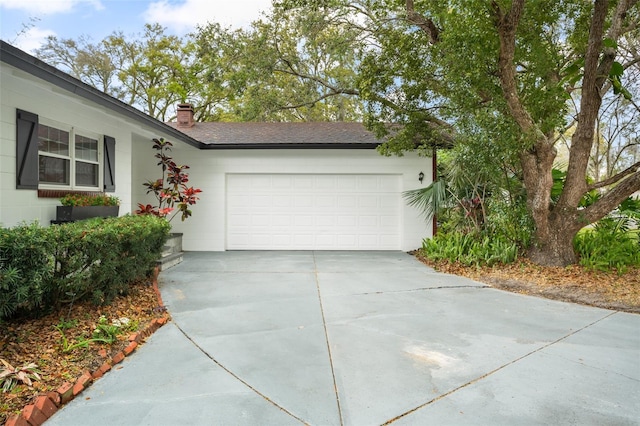 garage with driveway