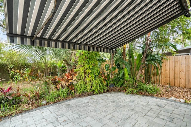 view of patio with fence