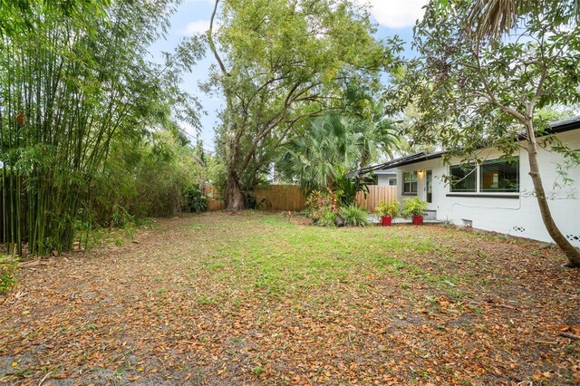 view of yard featuring fence