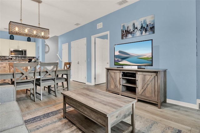 living room featuring light hardwood / wood-style flooring