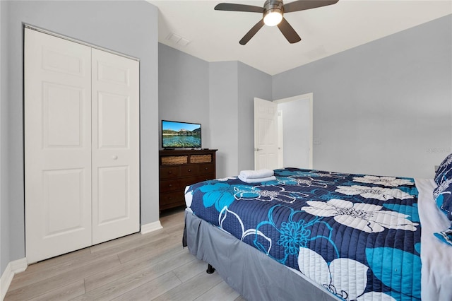 bedroom featuring ceiling fan and light wood-type flooring