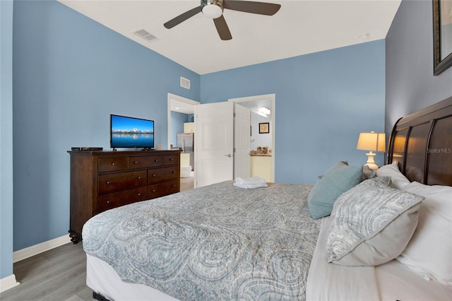 bedroom with hardwood / wood-style floors and ceiling fan